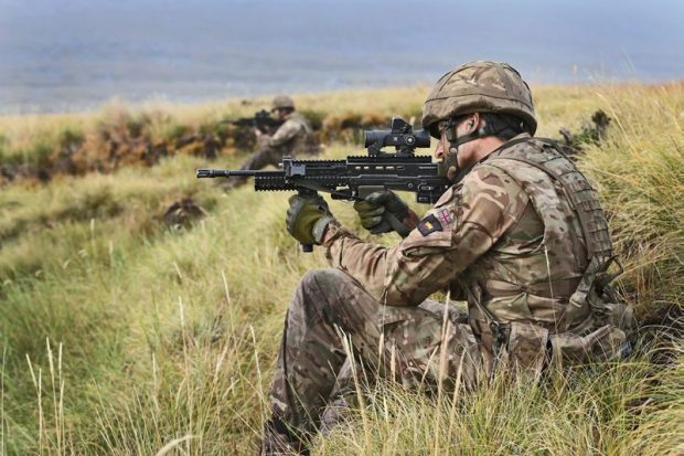 Pictured are soldiers from The Household Division operating their SA-80's during a live fire exercise, training thousands of miles from home on the infamous Onion Ranges in the Falklands. The Onion Range is a vast swathe of land which is used for training by the Army and located on a remote part of East Falkland island.