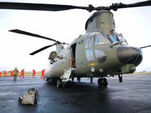 An RAF Chinook has flown food and supplies to areas of Cumbria isolated by snow drifts. Crown Copyright.