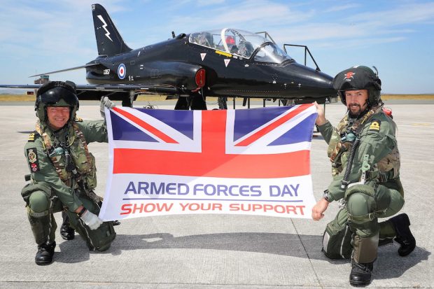 736 NAS Hawk Pilots Lt Nick Weightman (L) and Lt Tom Sawle show their support for Armed Forces Day 2018.