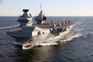 HMS Queen Elizabeth departs for the USA to land fast jets on deck for the very first time.
