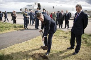 Image of the Defence Secretary Gavin Williamson cutting the first turf on a £132m facility for the UK’s new fleet of submarine hunting Poseidon Maritime Patrol Aircraft (MPA) at RAF Lossiemouth. 