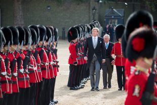 His Majesty King Willem-Alexander of the Netherlands and His Royal Highness Prince Charles, Prince of Wales inspecting 1st Battalion Coldstream Guards during the first day of the Dutch State visit.