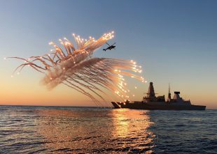 HMS Diamond's Wildcat Helicopter fires flares
