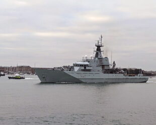 HMS Mersey sailing out of Portsmouth