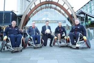 The Defence Secretary with members of the UK's Invictus Games team