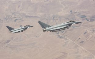 Two RAF Typhoons flying over desert
