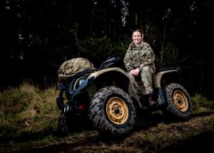 A female reservist on a quad bike