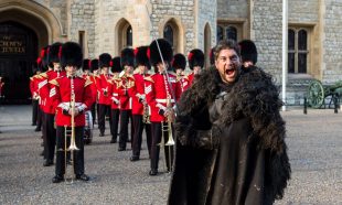 A Game of Thrones actor in front of the Coldstream Guards Band